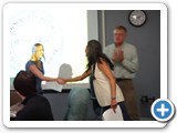 014 Haley McDuff is inducted into the Physics Honor Society, Sigma Pi Sigma with a handshake by Professor Mousumi Roy