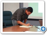 015 Adrian Orozco signs the register prior to induction into the Physics Honor Society Sigma Pi Sigma
