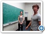 Grad students Leigh Norris and Ben Baragiola work out equations on the chalkboard at The Center for Quantum Information and Control (Deutsch)