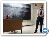 Nicholas C. Rajen presents his research with Associate Professor Mousumi Roy looking on