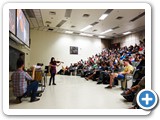 Using a violin in conjunction with the Rubens' Tube to show the standing wave patterns for sound in a musical instruments - at Regener Hall.