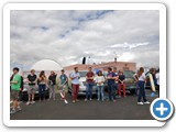 Periodic clouds obscured the eclipse. Grad students  and the public chatted as they waited for the clouds to part. 