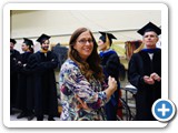 UNM Physics staffer Alisa Gibson with Physics and Astronomy professors waiting for the convocation