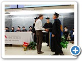 Department Chair Wolfgang Rudolph congratulates Austin K. Daniel on winning the William G. Larsen, Ph.D., Memorial Award for Best Teaching Assistant — at Regener Hall.