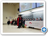 Julian Antolin Camarena gets hooded by dissertation director Sudhakar Prasad