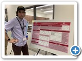 Undergraduate student Nic Litza with poster session