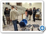 A 50 gallon blue metal barrel is crushed like a soda can from atmospheric pressure